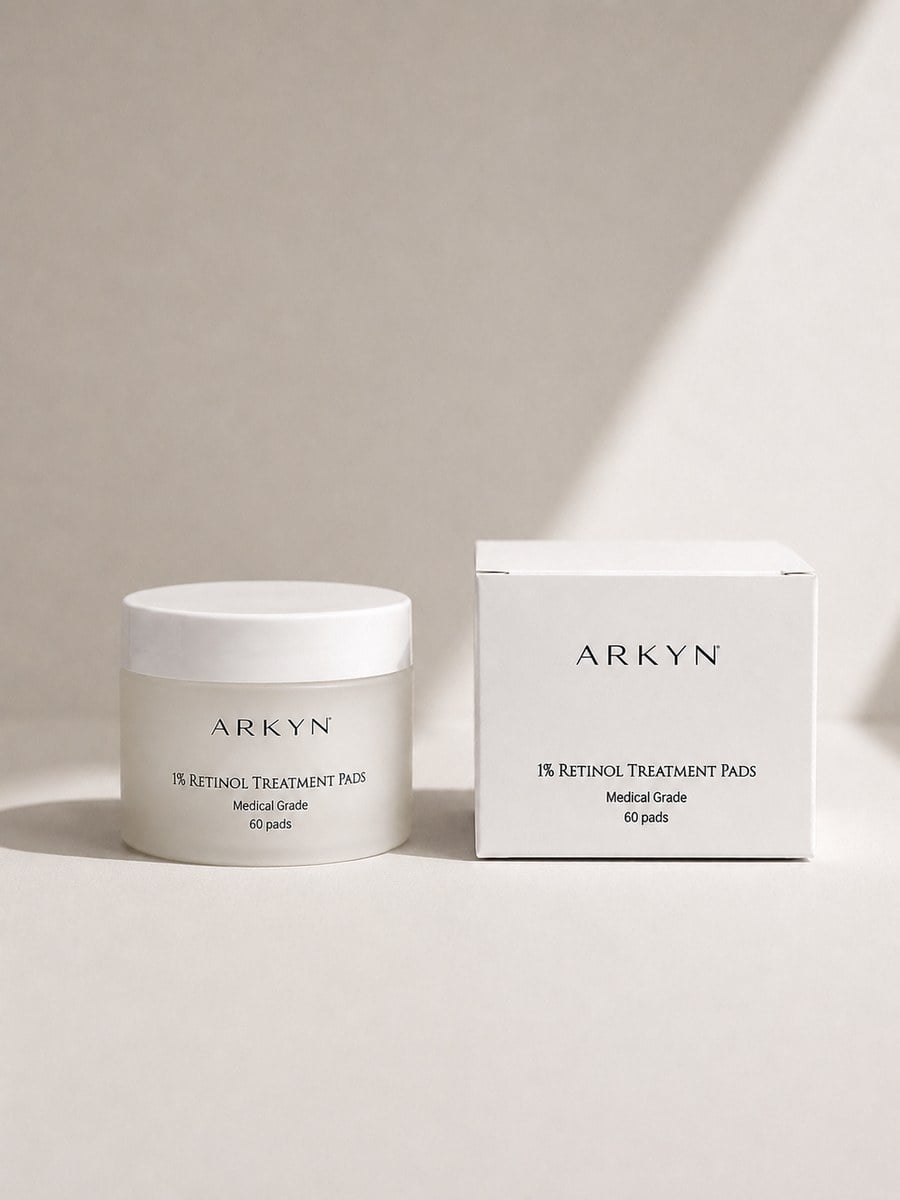 The Arkyn 1% Retinol Treatment Pads jar beside its box