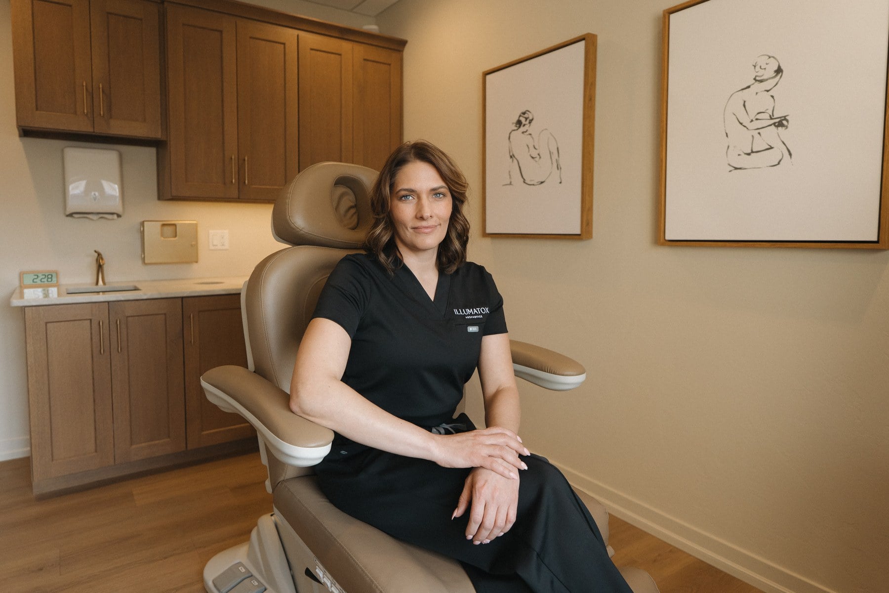A treatment chair in a room at Illumatox Aesthetic Studio in Neenah