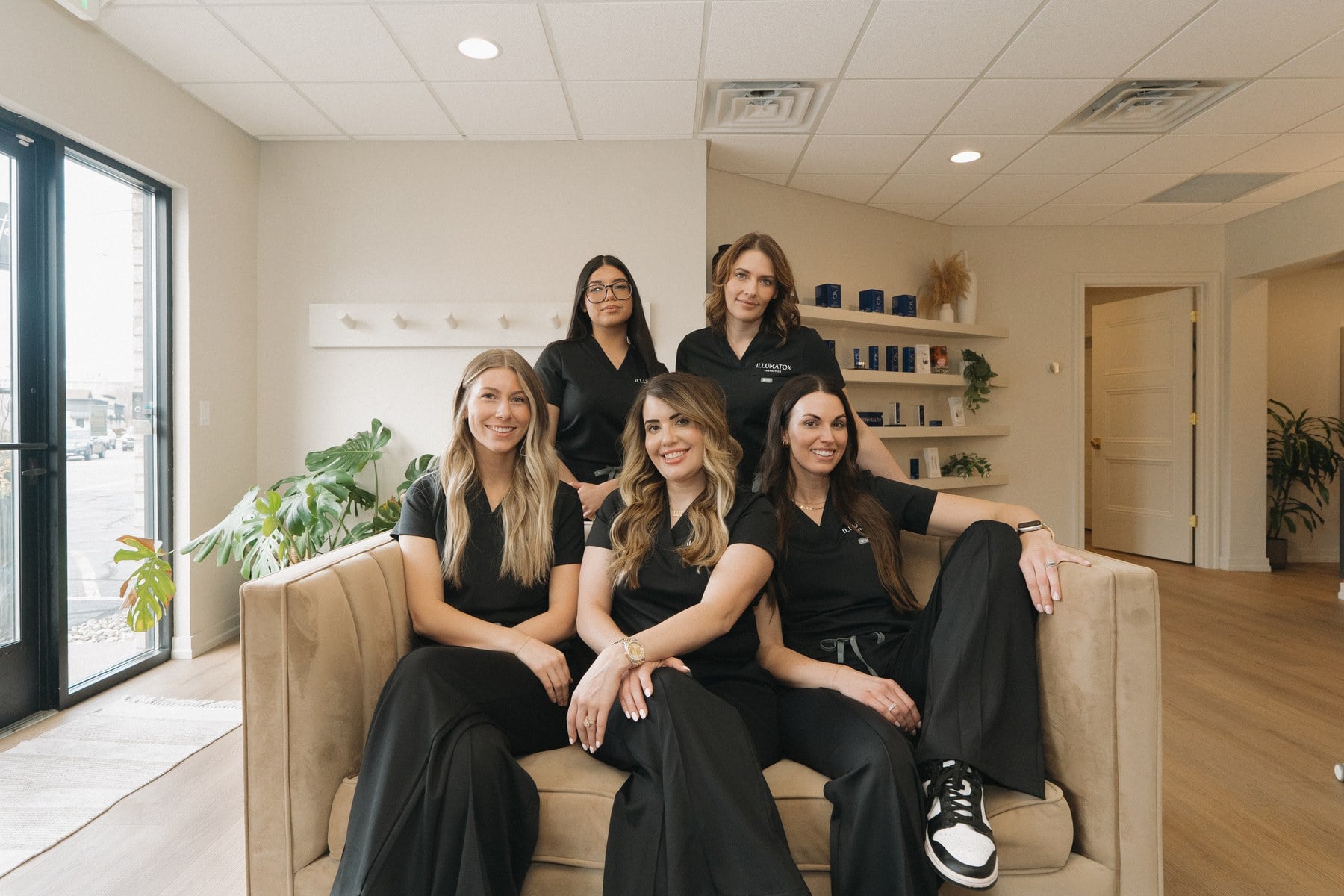 The lounge and window seating at Illumatox Aesthetic Studio in downtown Neenah