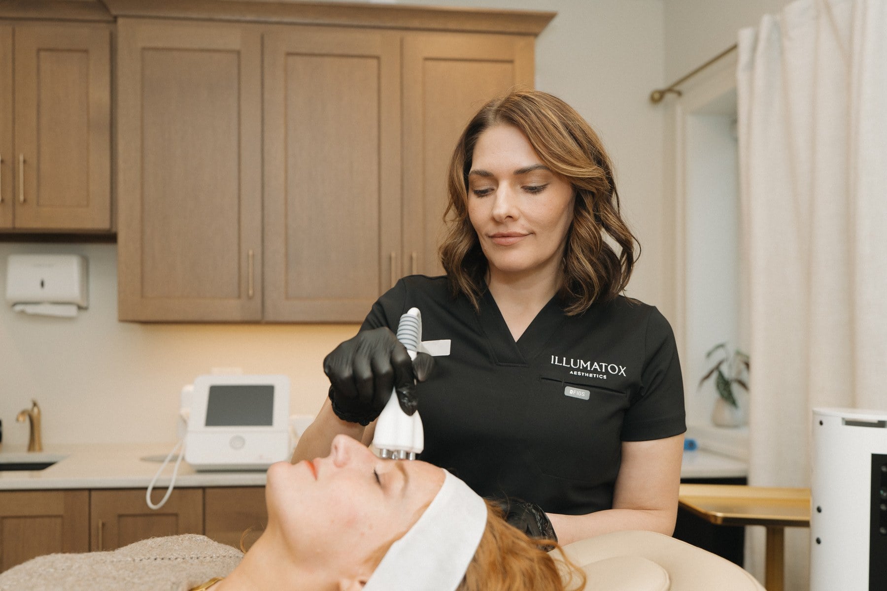 A body treatment room at Illumatox Aesthetic Studio in downtown Neenah