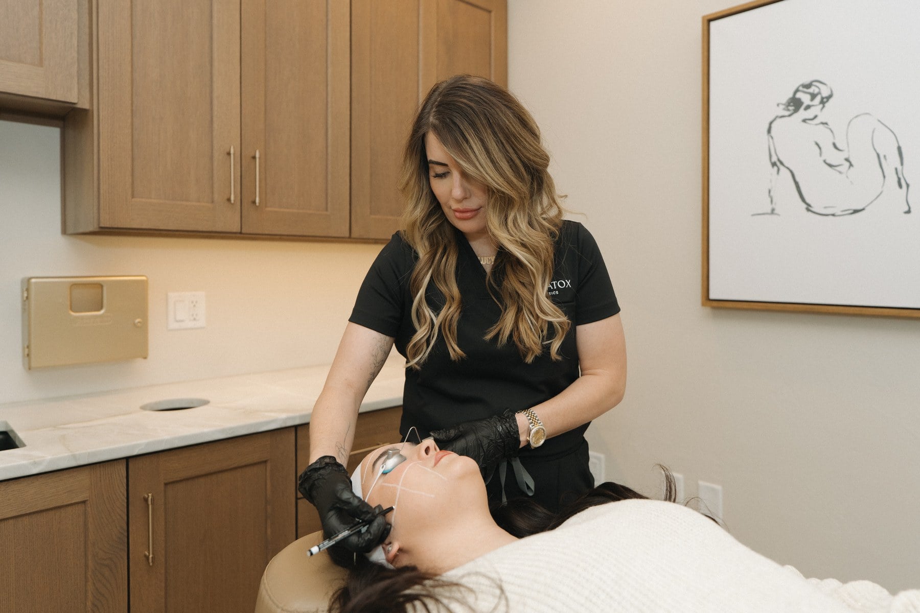 A close view of a facial treatment in progress at Illumatox in Neenah